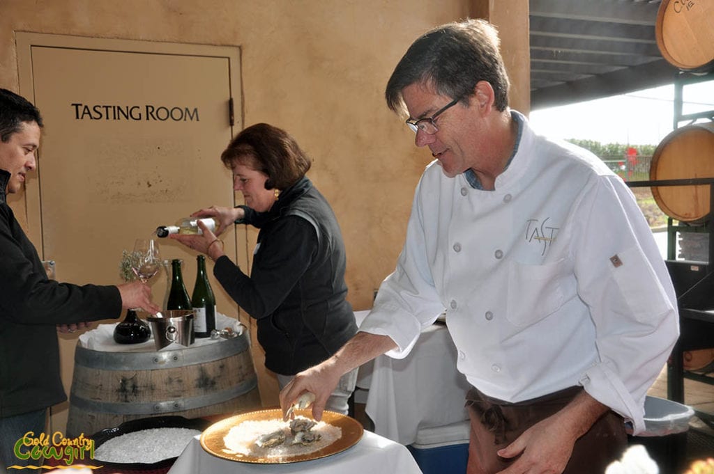 Chef and owner of Taste, Mark Berkner plating oysters