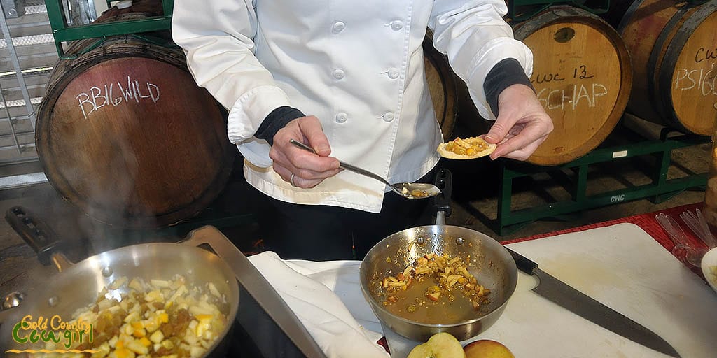 Tracy, co-owner of Taste serving up apple and meyer lemon Chutney