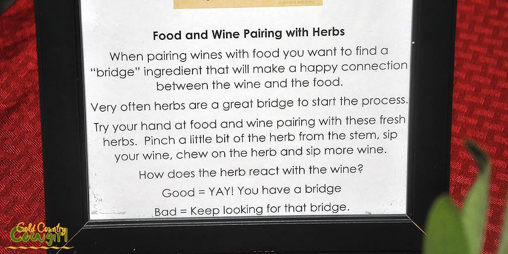 Sign with food and wine pairing with herbs description