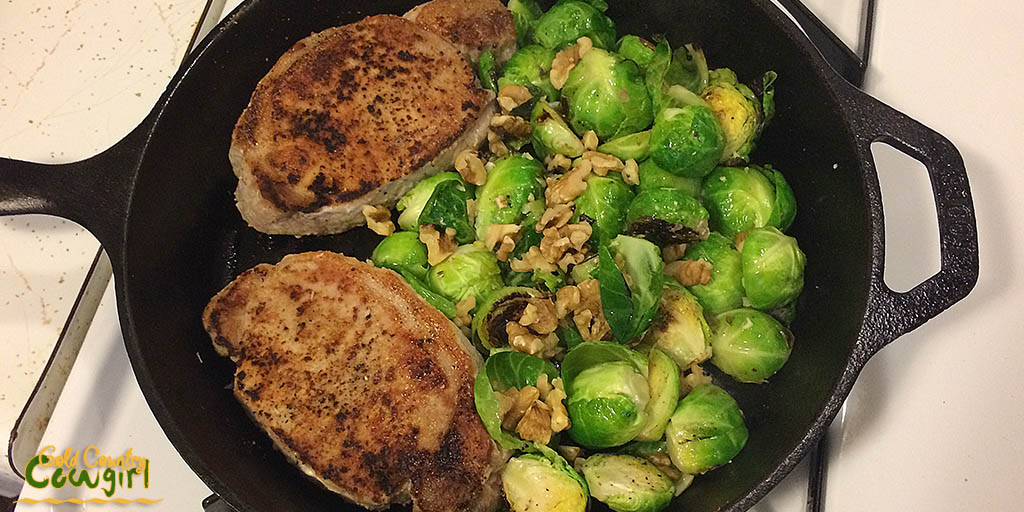 Pork chops and Brussels sprouts with walnuts