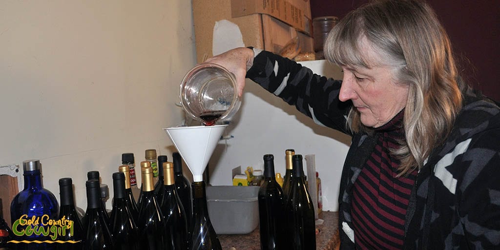 Corinne pouring a blend into a bottle