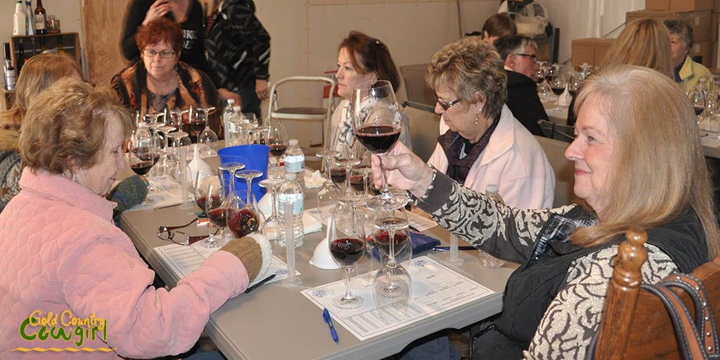 Connie checking for clarity of the wine during our wine blending class - the first S of wine tasting