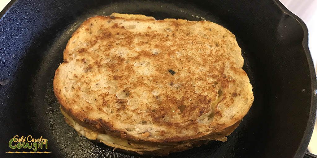 Grilled cheese in skillet toasted