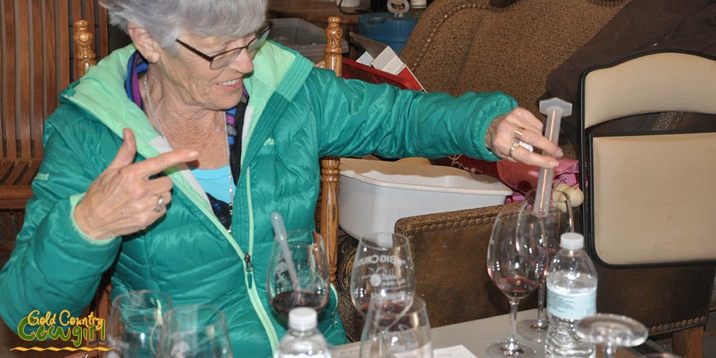 Judi pouring first wine of this blend into a glass