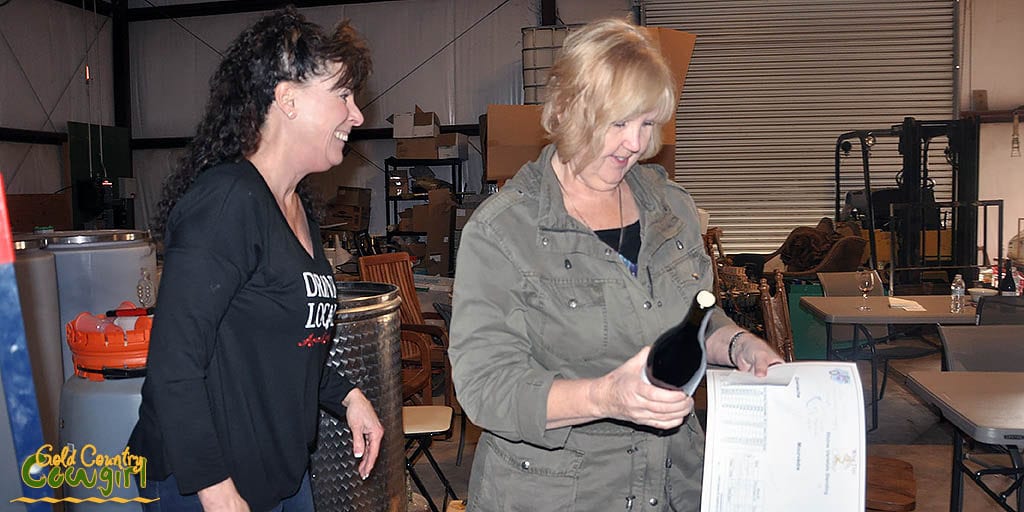 Sue with her corked bottle of wine