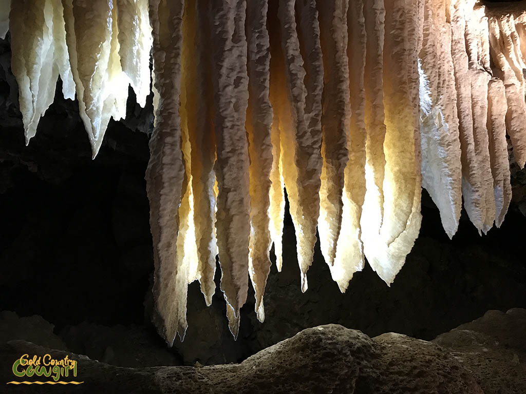 lighted formation inside cavern