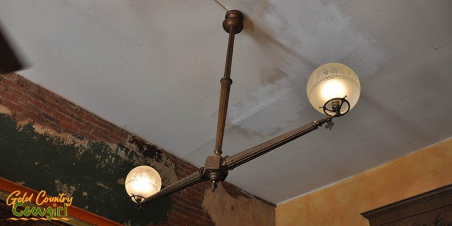 Old gas lights in bar, now converted to electricity