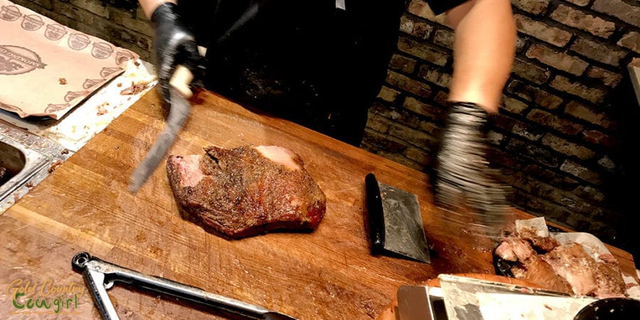 Carving authentic Texas barbecue brisket at The Smoking Oak