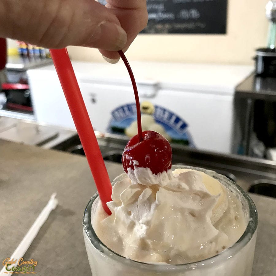 cherry on top of a root beer float at Shoo-fly Soda Shop in Glen Rose