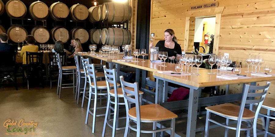 barrel room and preparation for wine and food pairing tasting at Kuhlman Cellars, one of Fredericksburg's best wineries