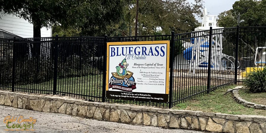 Oakdale Park Bluegrass sign with pool in background