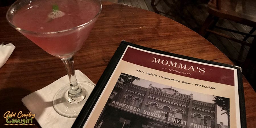 Cosmo and menu at Senglemann Hall, one of the best places to eat in Schulenburg, Texas