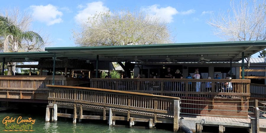 View of Riverside Club as Riverside Dreamer leaves the dock
