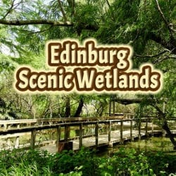 wooden boardwalk with text overlay: Edinburg Scenic Wetlands