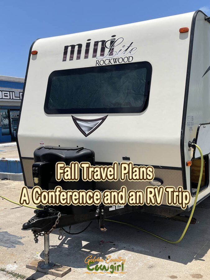 front of a travel trailer with text overlay: Fall Travel Plans A Conference and an RV Trip