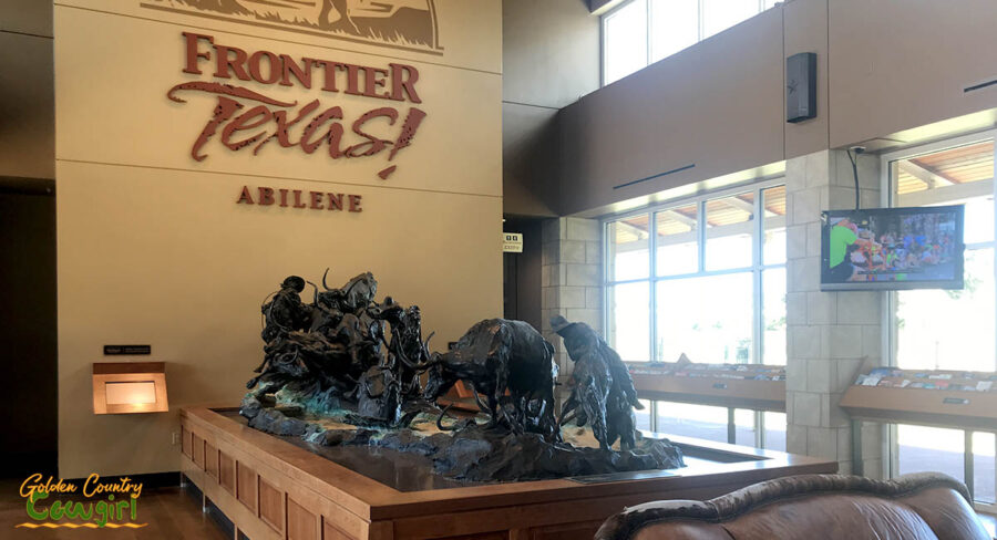 Interior of Frontier Texas! with large sculpture on table