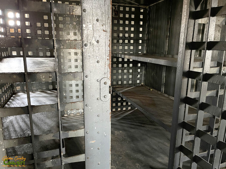 a jail cell with four bunks in the Brown County Jail in Brownwood Texas