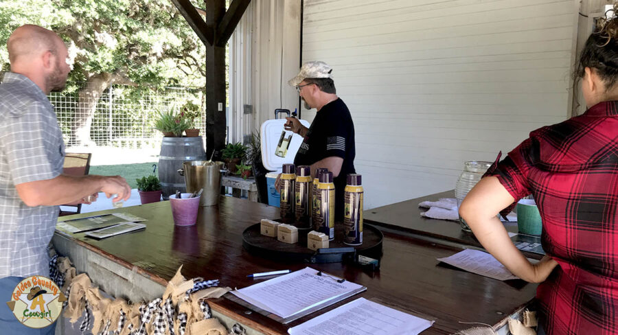 Chris Sheridan helping a customer at Lost Maples Winery