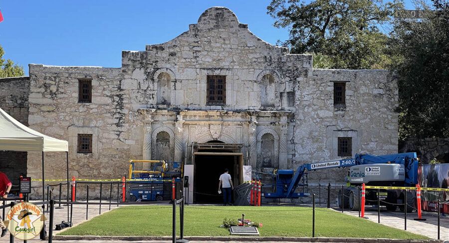 the front of the Alamo with equipment for working on preservation