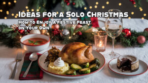 A festive table is set for one with tomato soup, a Cornish hen and a lava cake. Texty overlay says "Ideas for a Solo Christmas: How to Enjoy a Festive Feast on Your Own"